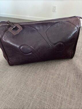 Frances Patiky Stein vintage leather clutch.  Deep eggplant color.  14” x 8”